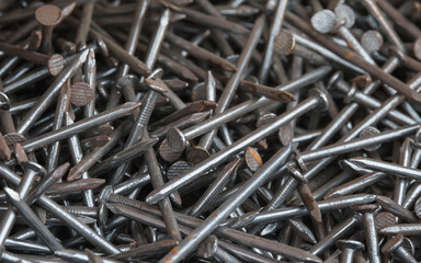 Nails stored in a box closeup.