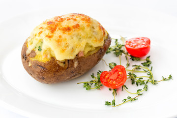 Jacket, baked potato -ham and cheese, macro, close up at restaurant