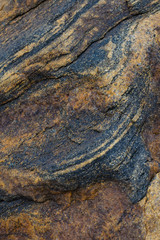 The texture of the stone.Granite,striped pattern.Close photographed.