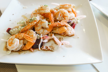 Homemade fresh shimp salad served on white plate
