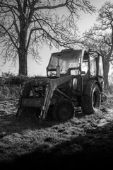 Fototapeta na wymiar Broken tractors 