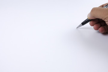 Handwriting over a white background. 
