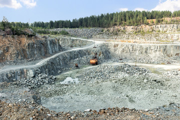 Open pit mining and processing plant for crushed stone