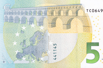 Close-up of part 5 euro banknote.