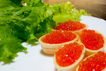 Delicious sandwiches with red caviar. Fresh bread for Breakfast.
