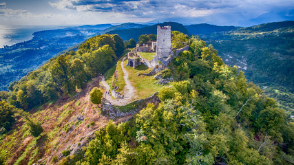 Ancient fortress with the remnants of the ruins on top of a mountain in New Athos, Abkhazia