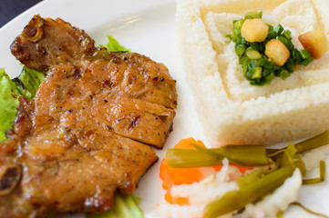 Grilled chop with rice and steam vegetables