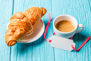 French bun, coffee cup, postcard