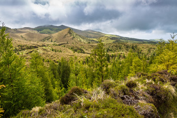 Landscape over blue and green lakes.