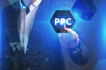 Business, Technology, Internet and network concept. Young businessman working on a virtual screen of the future and sees the inscription: PPC