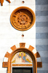 rose window  italy  lombardy       the mercallo old      tower   tile