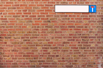 Brick wall background texture with cul-de-sac sign, good for graffiti