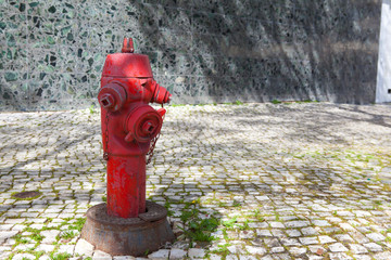 Red fire hydrant in  Lisbon Portugal