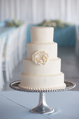 Obraz na płótnie Canvas wedding cake dessert sweet tier white simple elegant sexy design professional frosting