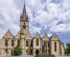 Fototapeta premium The Lutheran Cathedral of Saint Mary, Sibiu, Romania, against a beautiful sky