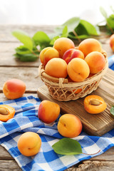 Ripe apricots fruit on grey wooden table