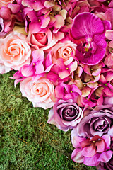 Artificial pink flowers background 