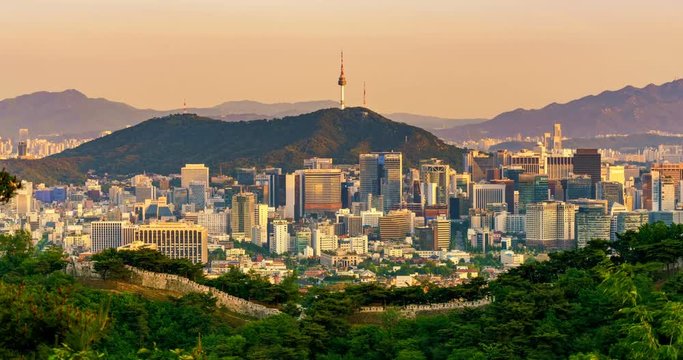 Aerial view of Seoul downtown cityscape and Namsan Seoul Tower from day to night. Seoul, South Korea.