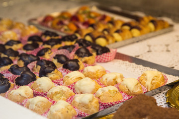 Tasty traditional sweets and pastries in italian shop