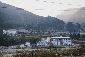 Powerplant with mountain in the sideway near Bagdogra. Darjeeling, India