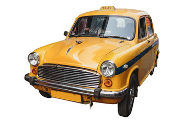 Fototapeta na wymiar Isolated yellow vintage taxi in Kolkata, India