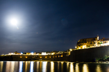 Fototapeta na wymiar Night view of Sicilian Bay in Castellammare Del Golfo, Italy
