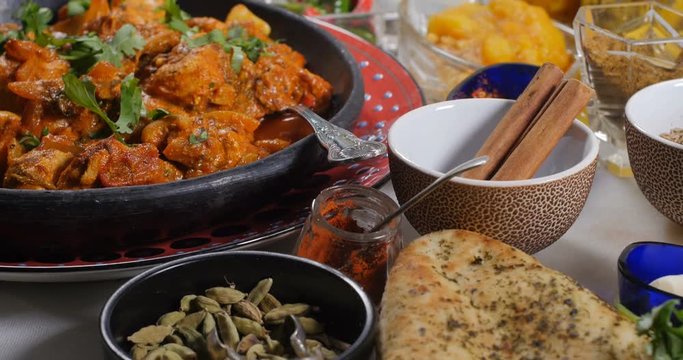 Dolly push in view of a delicious chicken tikka masala with Indian spices