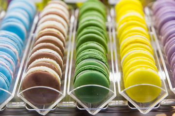 Lines of colorful  macaroons in intalian shop
