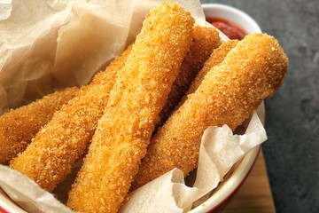 Bowl with cheese sticks, closeup