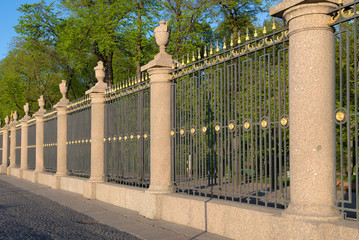 Decorative grille of the Summer Garden fence close-up in the May evening. , Saint-Petersburg