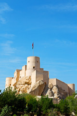 in oman muscat rock  the old defensive  fort battlesment sky and  star brick