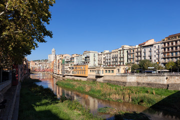 Fototapeta na wymiar Girona Cityscape Along Onyar River in Catalonia, Spain