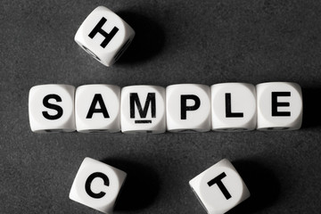 word sample on toy cubes