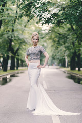 Beautiful young woman in a prom dress