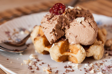 chocolate icecream on gofre and chocolate flakes