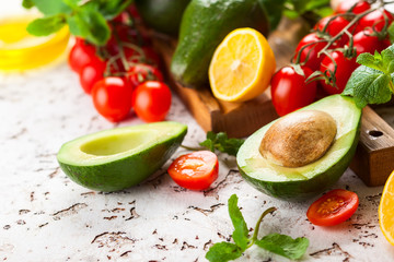 Avocado, cherry tomatoes, citrus and fresh herbs