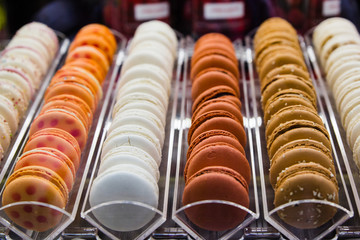 Lines of colorful  macaroons in intalian shop