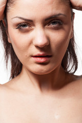 Fototapeta premium Portrait of gorgeous model posing in fashion style. Wet hairs. Studio posing