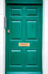 A bluish green door.