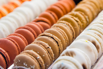 Lines of colorful  macaroons in intalian shop