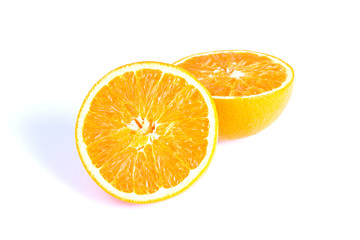 Split oranges on white background