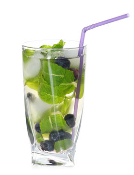 Tasty lemonade with mint and blueberries on white background