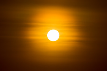 Big sun on the orange sky.