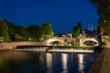 The river Pegnitz with cascades in the old town of Nuremberg, Germany