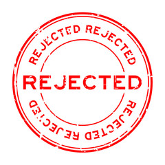 Grunge red rejected round rubber seal stamp on white background
