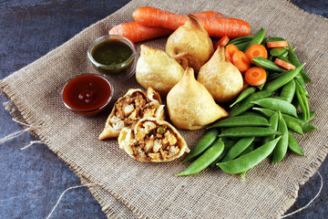 Indian special traditional street food punjabi samosa or Coxinha, Croquete and other Fried...