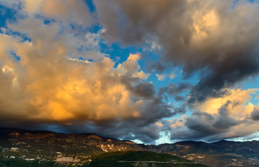 Sunset landscape of sky and rocks near Budva