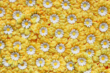 Background of artificial chamomiles