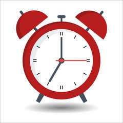 Red alarm clock on white background