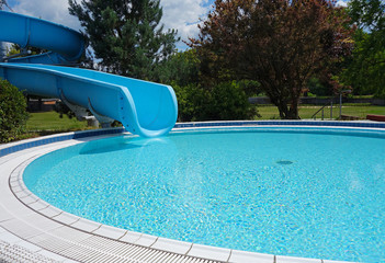 Outdoor pool with water attractions